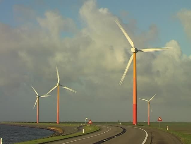 Windturbines along the IJsselmeer in the Netherlands
