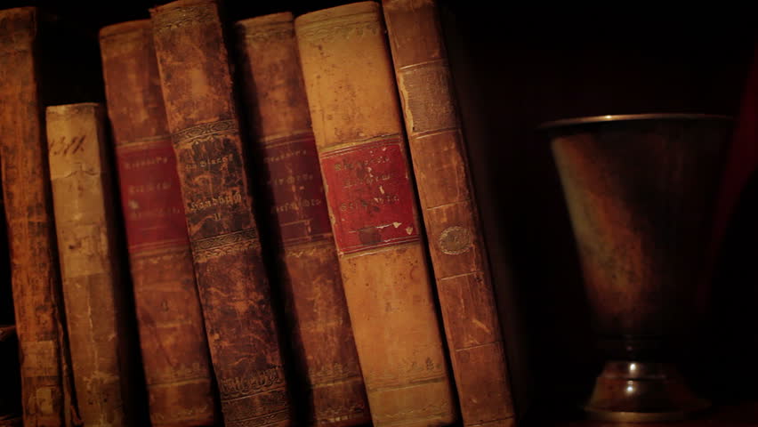 Ancient books in a bookshelf