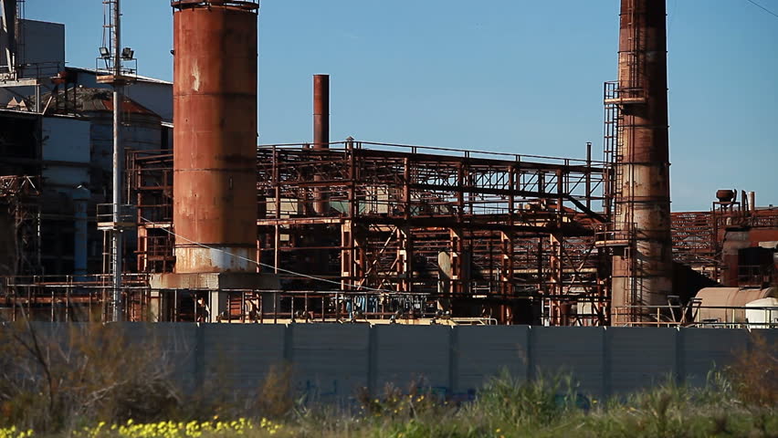 Abandoned Industrial Buildings. Rusty and obsolete structure.