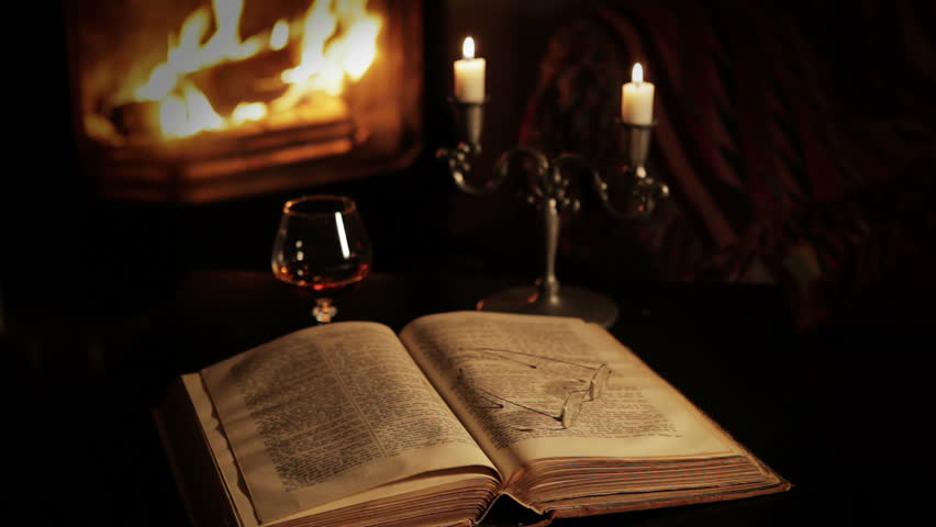 A glass of brandy in front of the fireplace