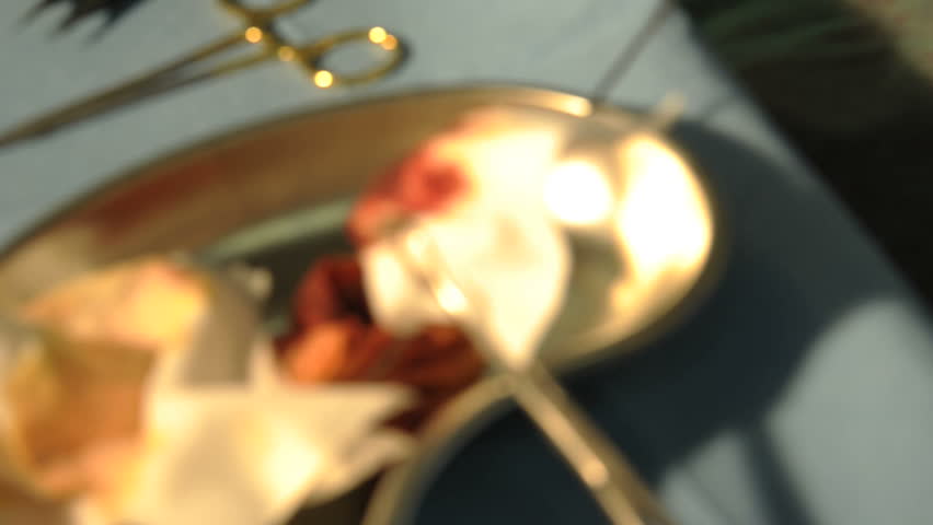 Tracking shot - Patient Receiving A Cosmetic Operation; HD Photo JPEG, dolly.