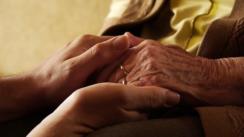 Senior old woman young man hold hand wrinkle skin close up 
