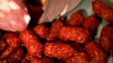 plate with carbonado and sausages