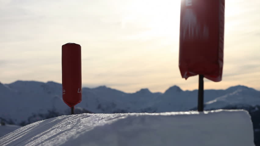 Girl skiing in snowboarding park Trick jump. Location:  France Source: Canon EOS 5D Mark II