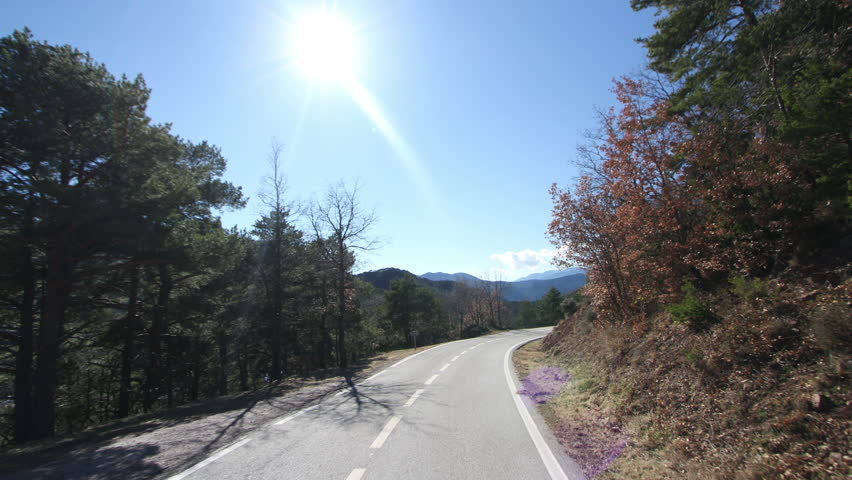 shot from a moving car with the camera clamped to the roof, pyrenees, spain 