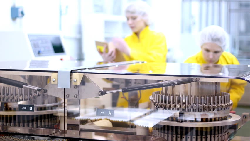 Automatic filling machine for the production of medicines in ampules. HD 1080p.