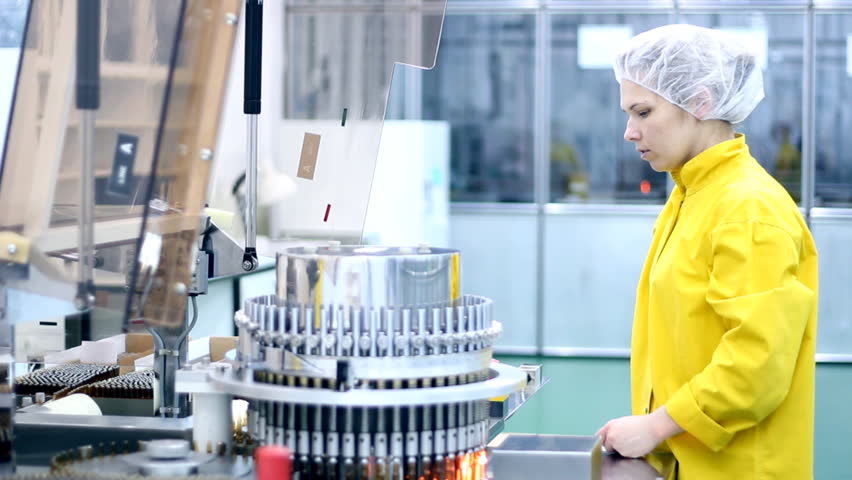 Preparing machine for work in pharmaceutical factory.  HD 1080p.