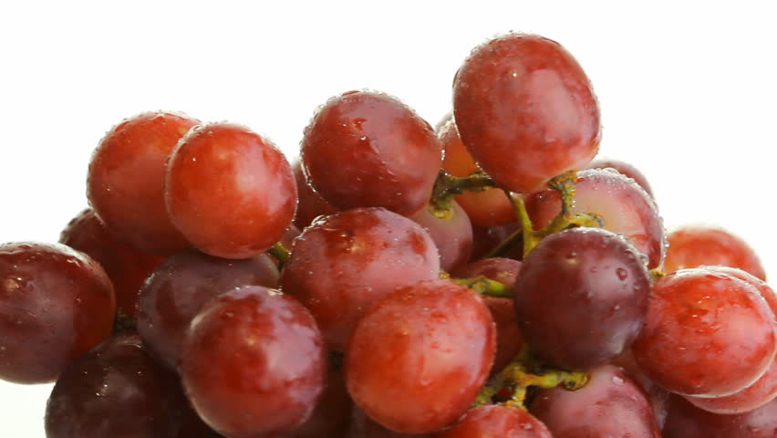 red grapes on a white background