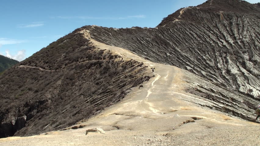 Sulfur porter on Volcano road. Java
