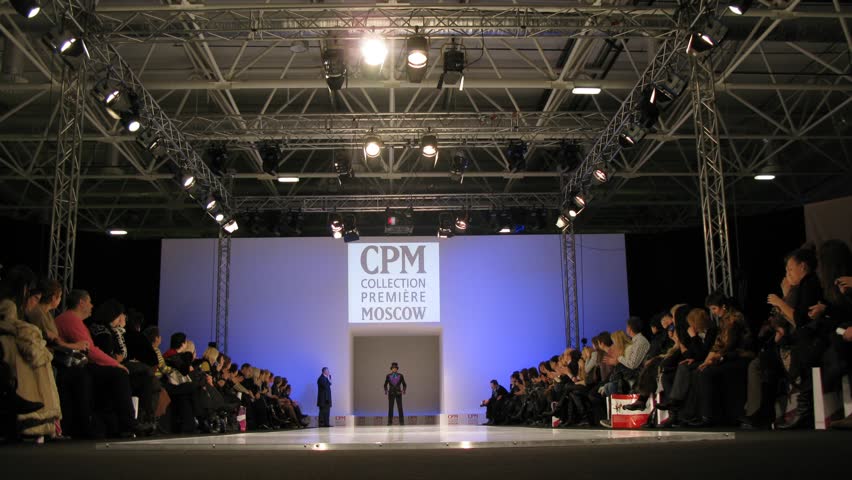 MOSCOW - FEBRUARY 22: Men and women model new Slava Zaytsev fashion line on catwalk during Collection Premiere Moscow, (CPM), February 22, 2011 in Moscow, Russia.  Over 1,350 brands of different segments (women's, men's, children's wear, Young Fashion, le