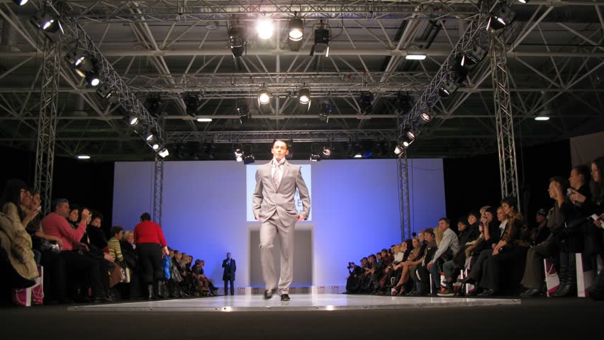 MOSCOW - FEBRUARY 22: Men model new Slava Zaytsev fashion line on catwalk during Collection Premiere Moscow, (CPM), February 22, 2011 in Moscow, Russia.  Over 1,350 brands of different segments (women's, men's, children's wear, Young Fashion, leather wear