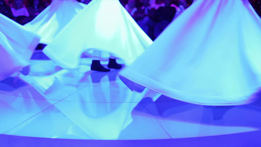 footage shot during a sema ceremony, of sufi dervish dancers