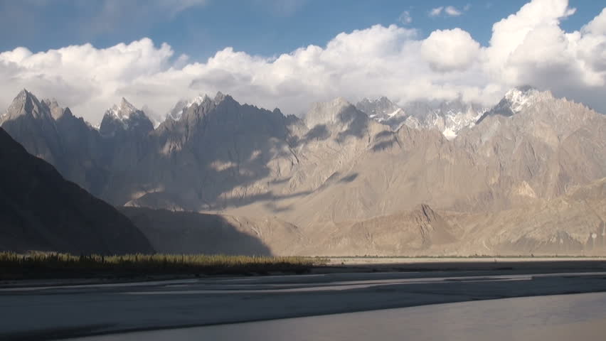 Light fades over dramatic mountain scenery in remote region of Northern Pakistan