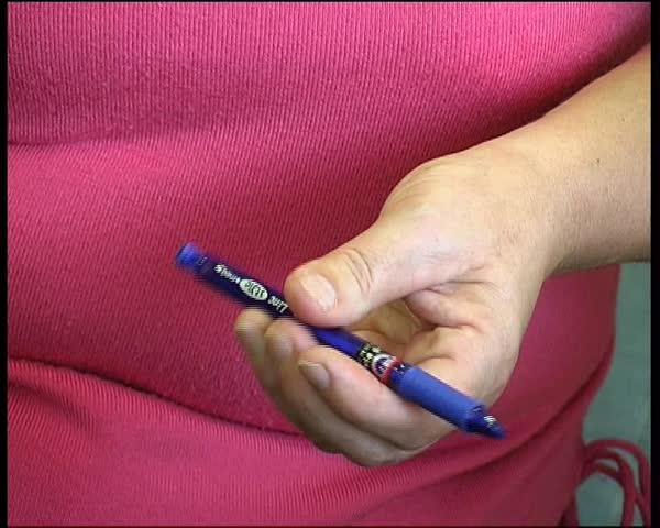 pen in the hands 