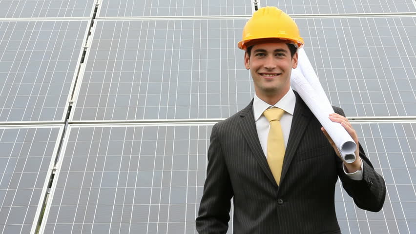 Engineer at solar power station; Full HD Photo JPEG