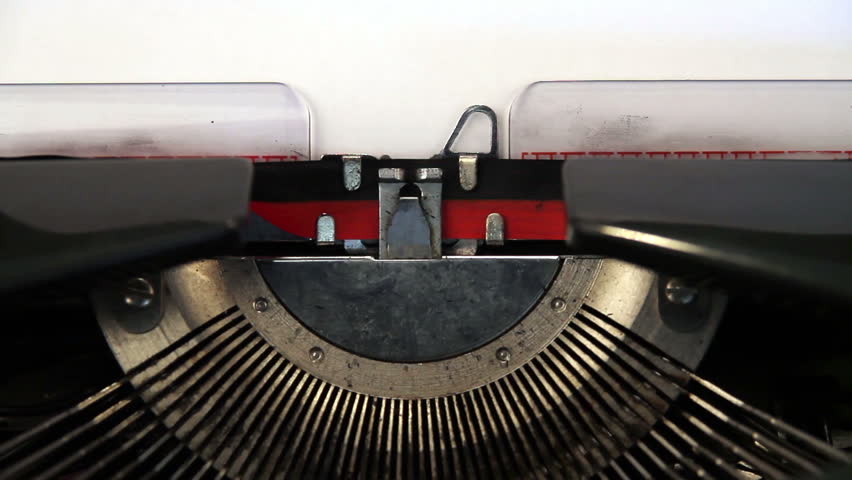 Vintage typewriter typing the words "Breaking News"