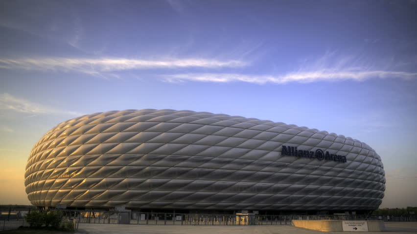 MUNICH, GERMANY - APRIL 23: Timelapse of Allianz Arena, April 23, 2011 in Munich, Germany. Allianz Arena is the first stadium in the world that has a full changing color outside.