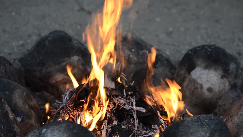 Campfire outdoors in late cold night