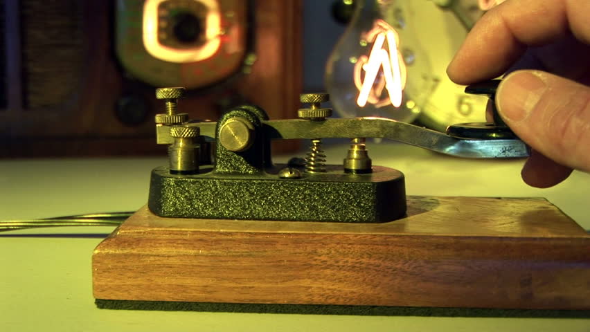 Radio operator makes an attempt to send the ships position. Lit with yellow gel and vintage props to portray the time. 