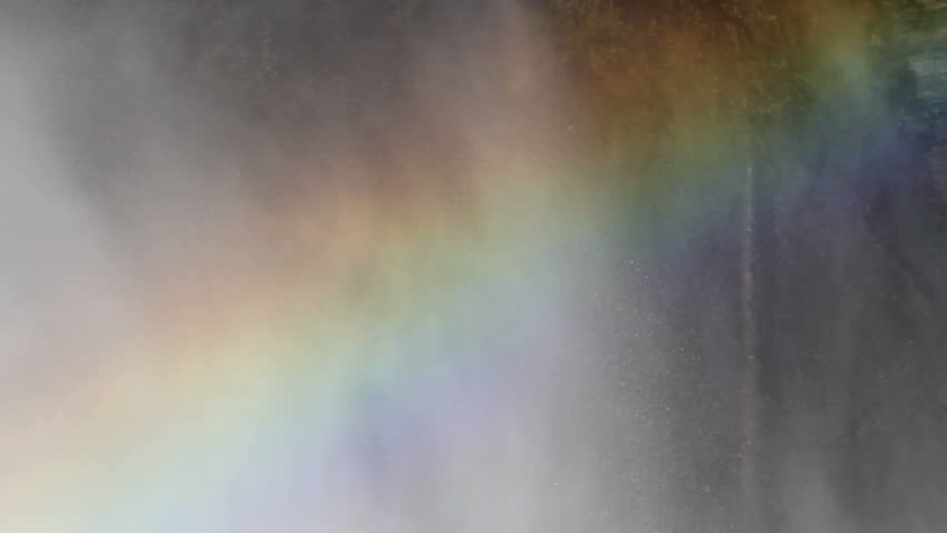 Rainbow in spray from hydro dam