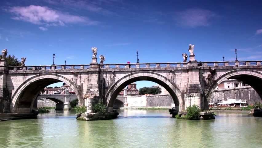 Sant Angelo Bridge at summer, camera moves down the river and go under the bridge