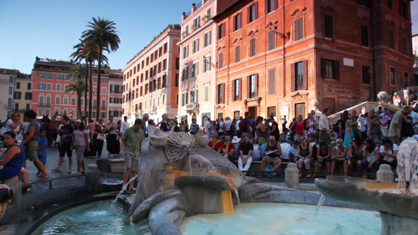 ROME - AUGUST 4: Tourists walk on Spanish Steps (Italian: Scalinata della Trinita dei Monti) on August 4, 2010 in Rome, Italy. Panorama from left to right. Scalinata is widest staircase in Europe.