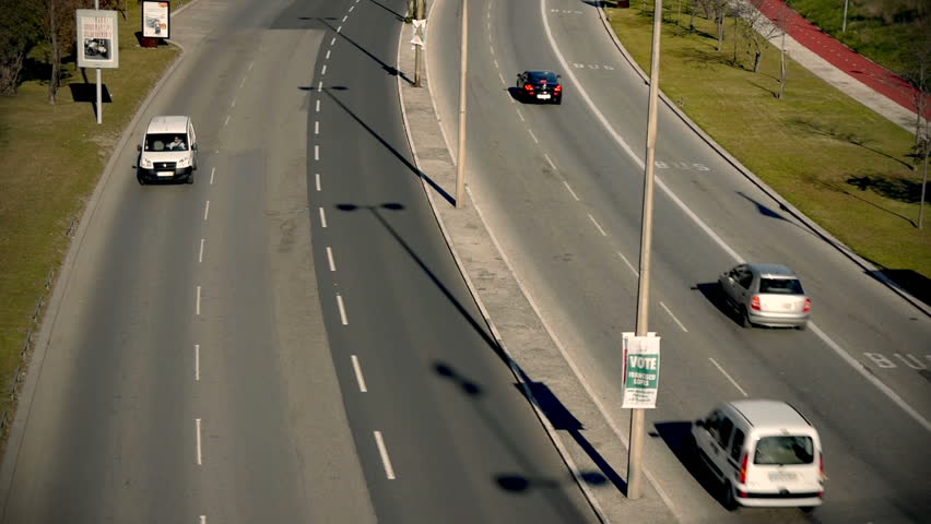 A daytime time-lapse video of city road in Lisbon, Portugal. Close shot.