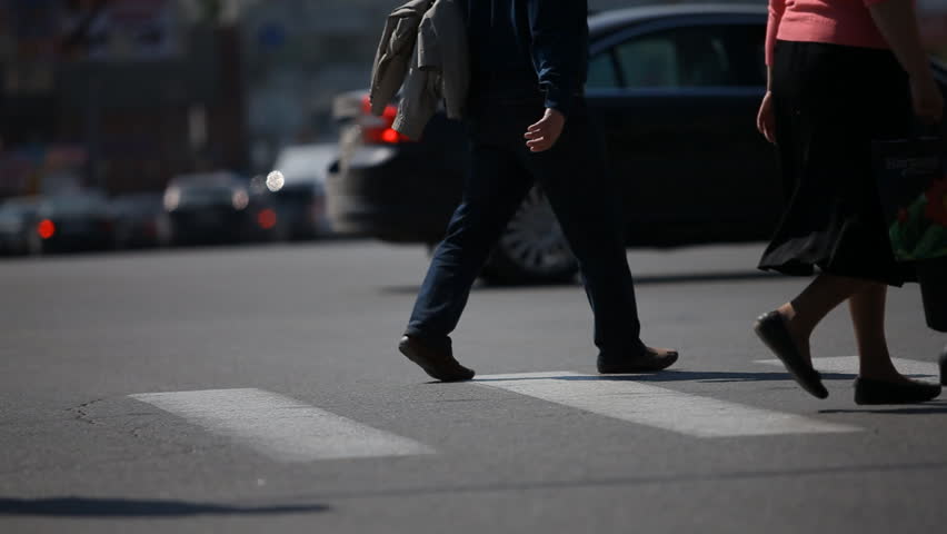 People crossing street. Crowded crosswalk. Timelapse