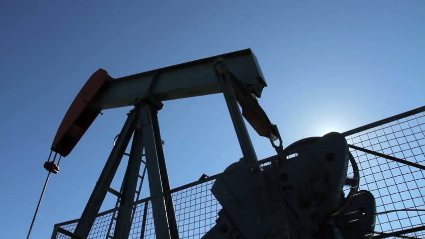 Crude oil pump jack with sunburst