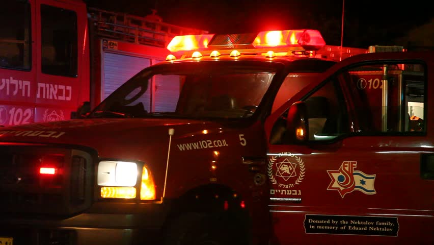 TIRAH, ISRAEL - DECEMBER 2: Fire trucks at work during Mount Carmel fire, December 2, 2010, Tirah, Israel. The 2010 Mount Carmel forest fire began at 11:00 local time on December 2, 2010 and caused severe property and ecological damage. 