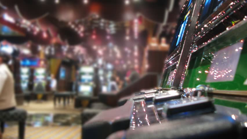 Slot machines in casino on board of cruise liner, closed up, side view, time lapse