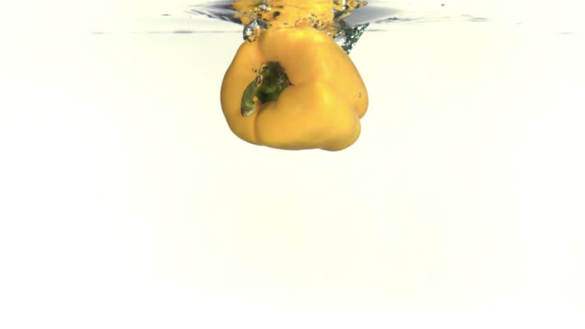 Paprika splashing into water filmed in slow-motion at 1000fps