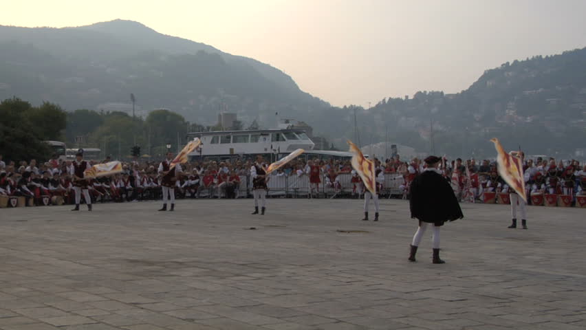 COMO, ITALY - CIRCA SEPT 2011:  Palio del Baradello re-enacts Barbarossa's visit to his allies in Como after defeating Milan in the 1159 battle, circa Sept 2011, Como, Italy. Period dances, games and shows create a medieval atmosphere at this annual event