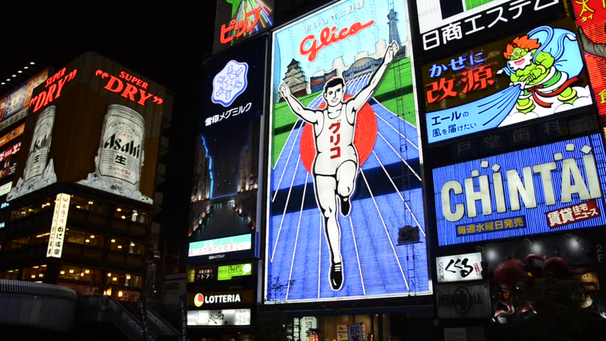 OSAKA, JAPAN - SEP 21: Glico Man billboard in Dotombori, September 21, 2011 in Osaka, Japan. Dotonbori is famous for its many neon signs, including candy manufacturer Glico's display of a runner.