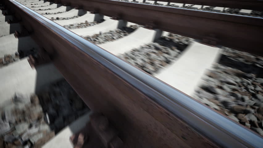 Close up of camera moving along railway. Seamless loop.