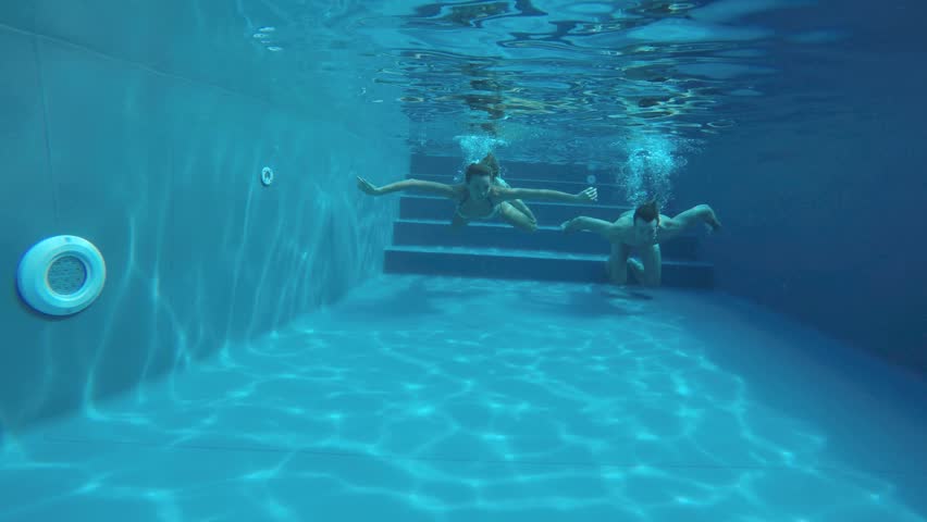 Couple Diving Underwater In Swimming Pool Stock Footage Video 5355092 Shutterstock