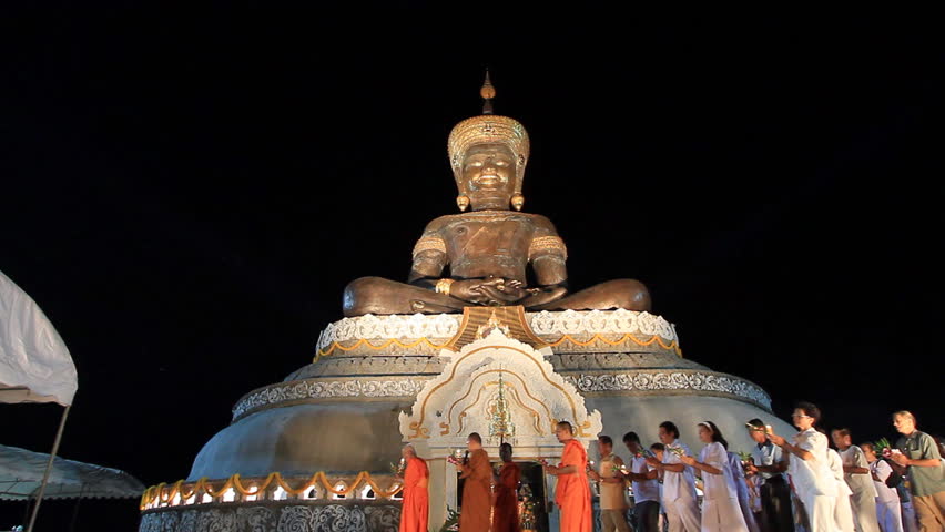 PHETCHABUN, THAILAND - SEPT 30: Thai Buddhists celebrate Buddha Sriracha ("Buddha's Feast"), September 30, 2011 in Phetchabun, Thailand. Nearly 95% of Thailand's population is Buddhist of the Theravada school. 