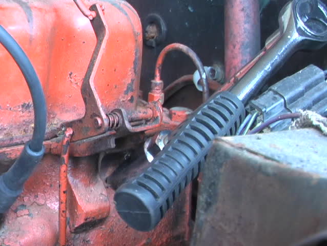 Ratchet And Socket Changing Spark Plug