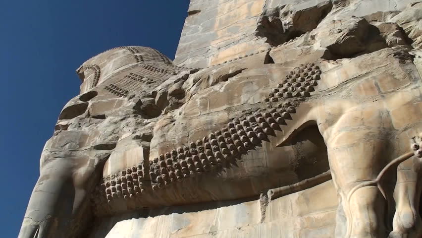 A bas relief carved in stone in the ruins of the ancient city of Persepolis in Iran.