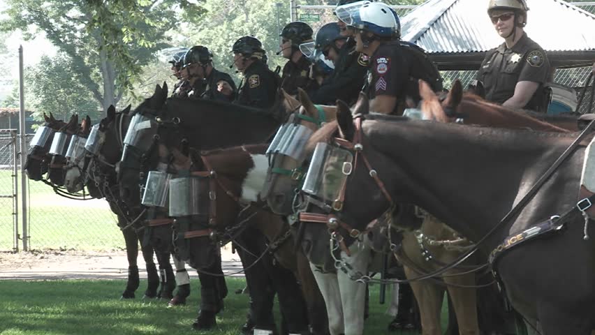 DENVER, CO - CIRCA 2008: Riot police on horseback in Denver Colorado during the 2008 Democratic National convention circa 2008 in Denver Colorado.