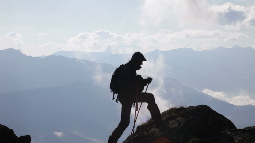 The traveler, mountains and clouds
