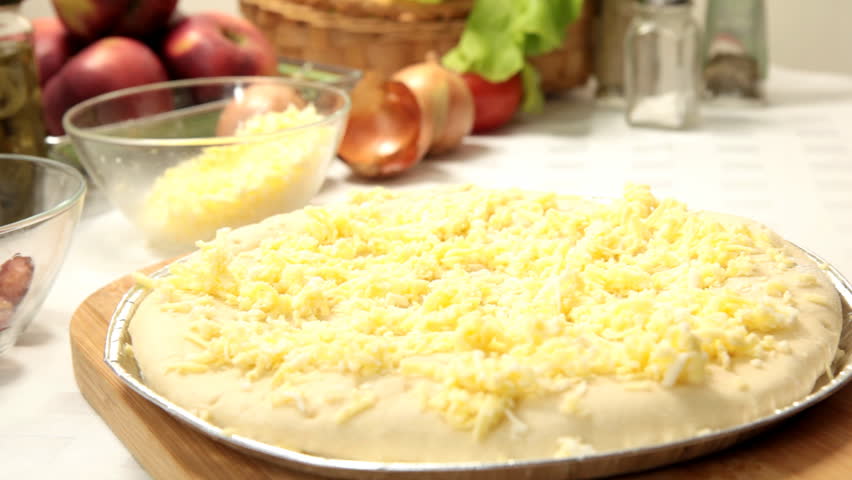 Making pizza - fried onion and paprika