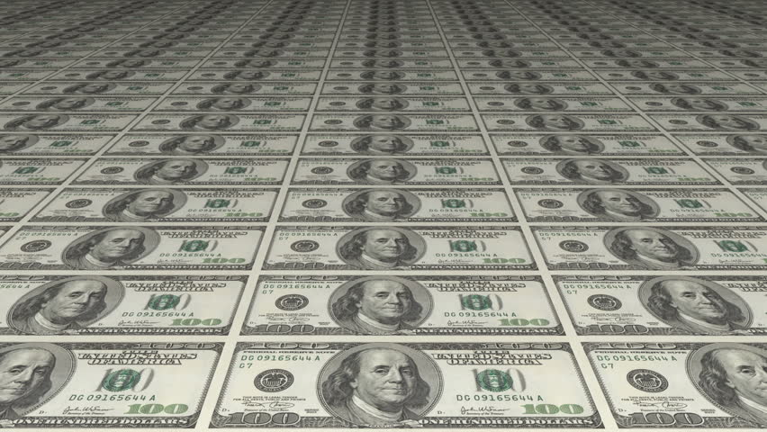 Two uncut sheets of American dollars in receding parallel lines, rear one magnified