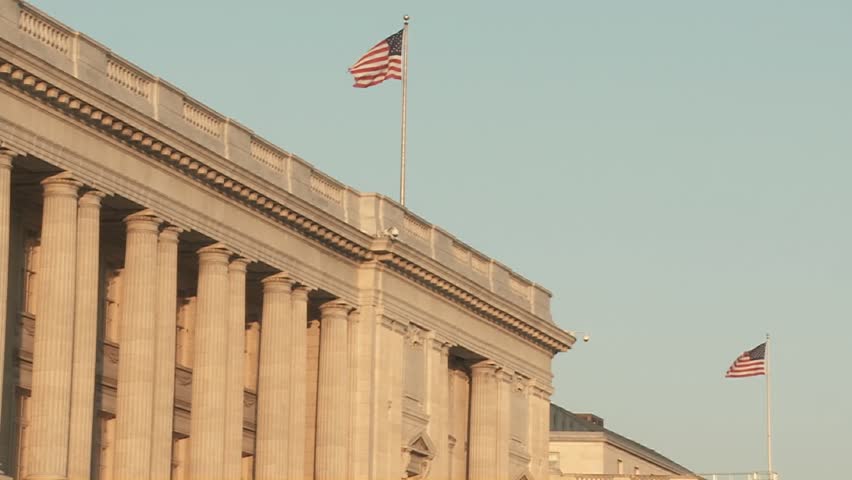 Flags fly atop buildings in Washington D.C.