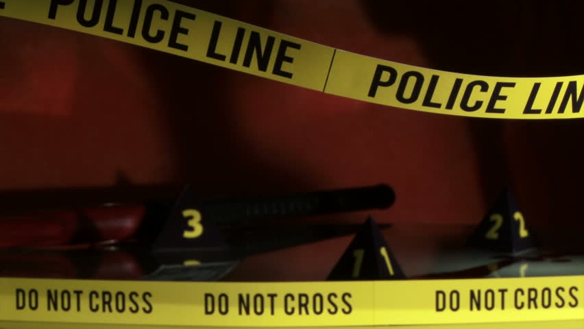 Crime Investigation, police line, yellow tape, scene. Camera dolly.