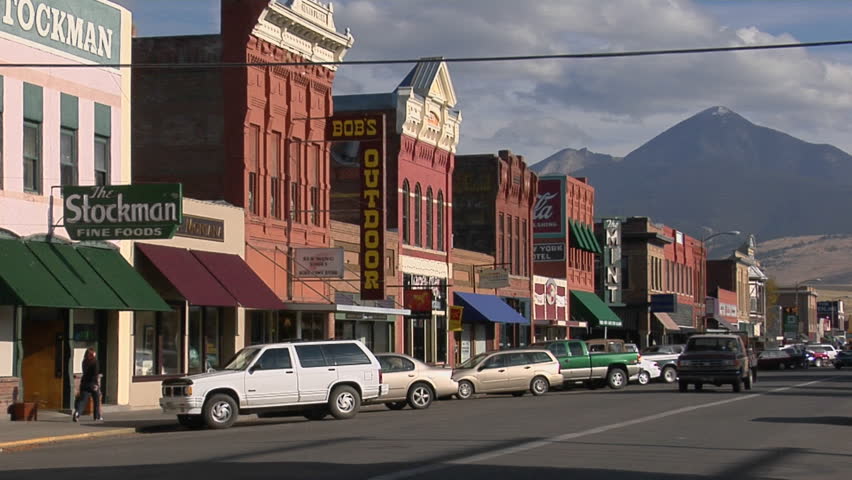 BIG TIMBER, MONTANA - CIRCA 2009: People walk along a street in a quaint Western town.