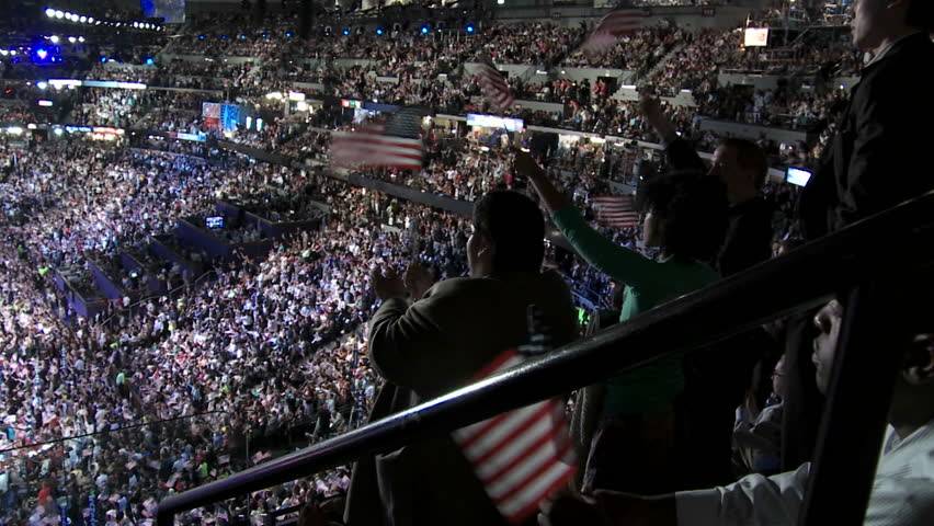 A zoom in to a  shot of Former President Bill Clinton as the crowd boo's at the mention of Republicans during the 2008 Democratic National Convention in Denver Colorado.