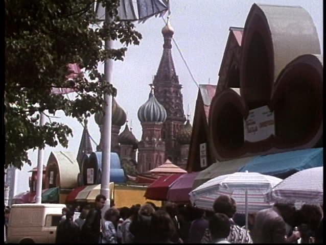 MOSCOW, RUSSIA - CIRCA 1970: Pedestrians walk through Red Square in this archival shot of the former Soviet Union.