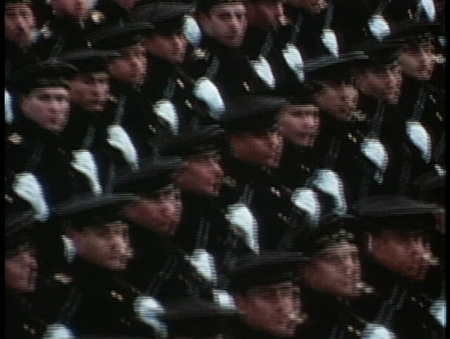 Soviet troops march in a grand parade during the Cold War.