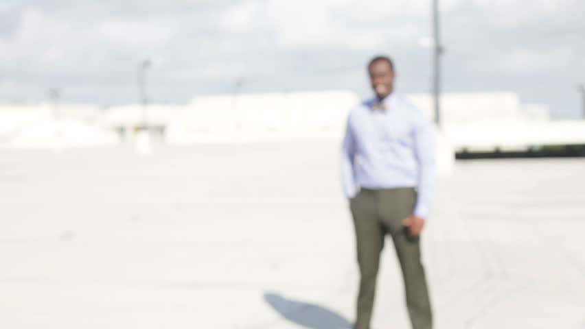 Video of a handsome black businessman smiling